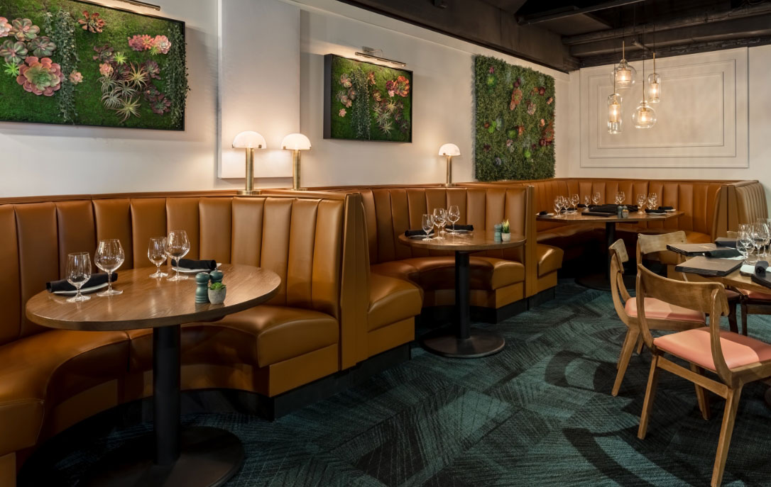 dining room with gold color booths